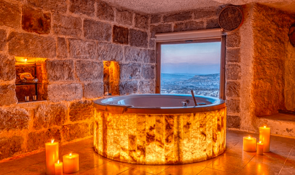 Luxury Cappadocia cave hotel at sunset for couples